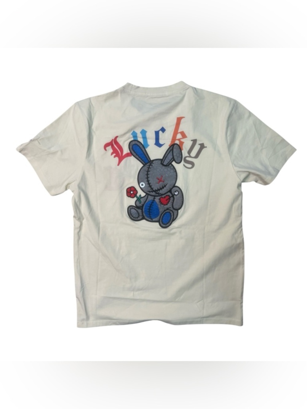 Sz M Cream Graphic Lucky charm Tee with Blue & Red Lettering